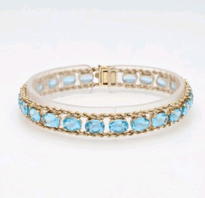 Armreif 585/14K Gelbgold Blau Topas 25ct