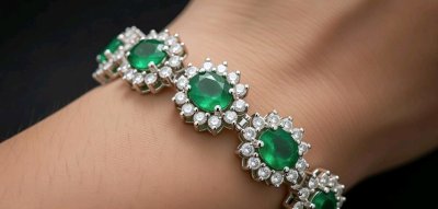 Armreif 585 Gold 8,82ct Diamant & Smaragd
