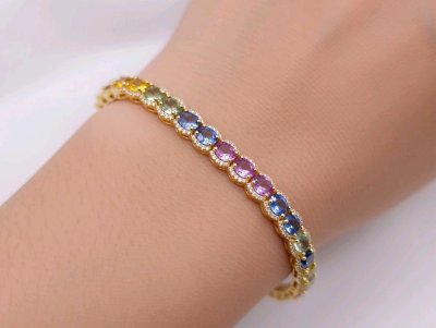 Armreif 750 Gold Saphir 12,99ct Diamant 0,61ct